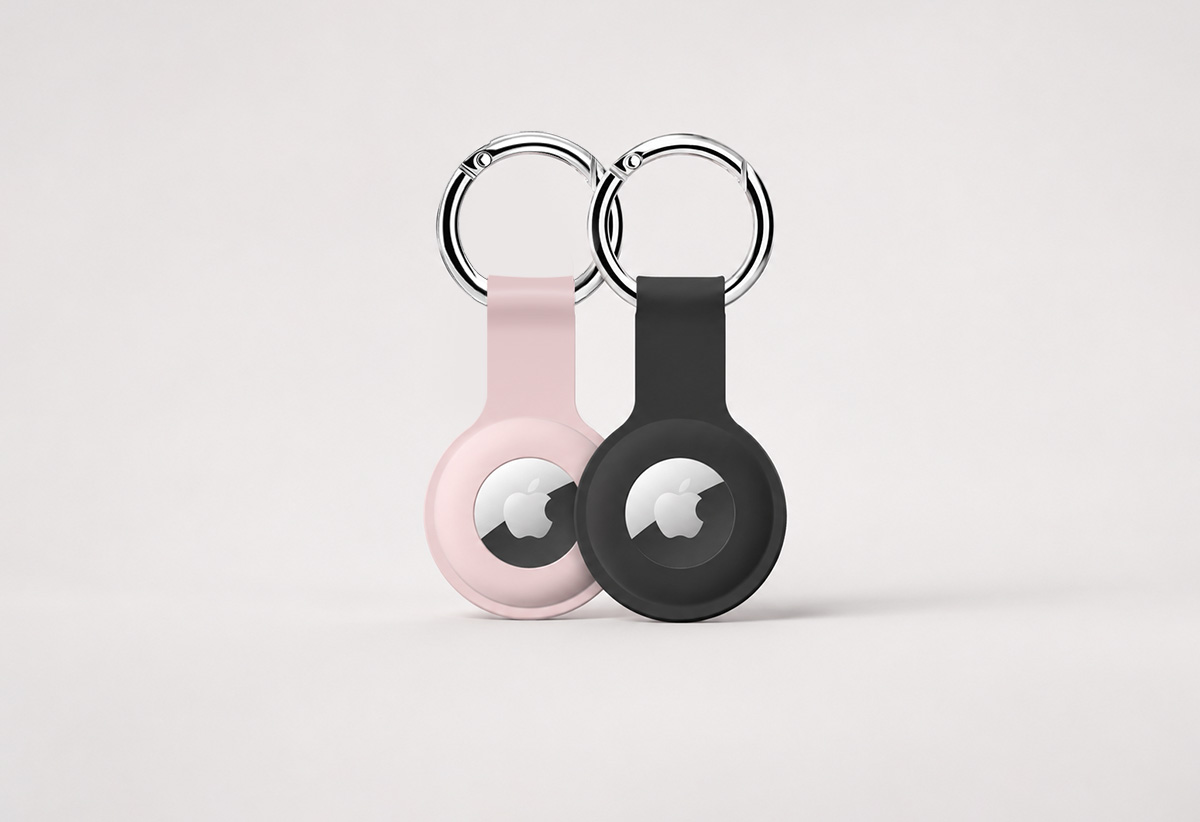 ColorCoral pink and black AirTag silicone holders