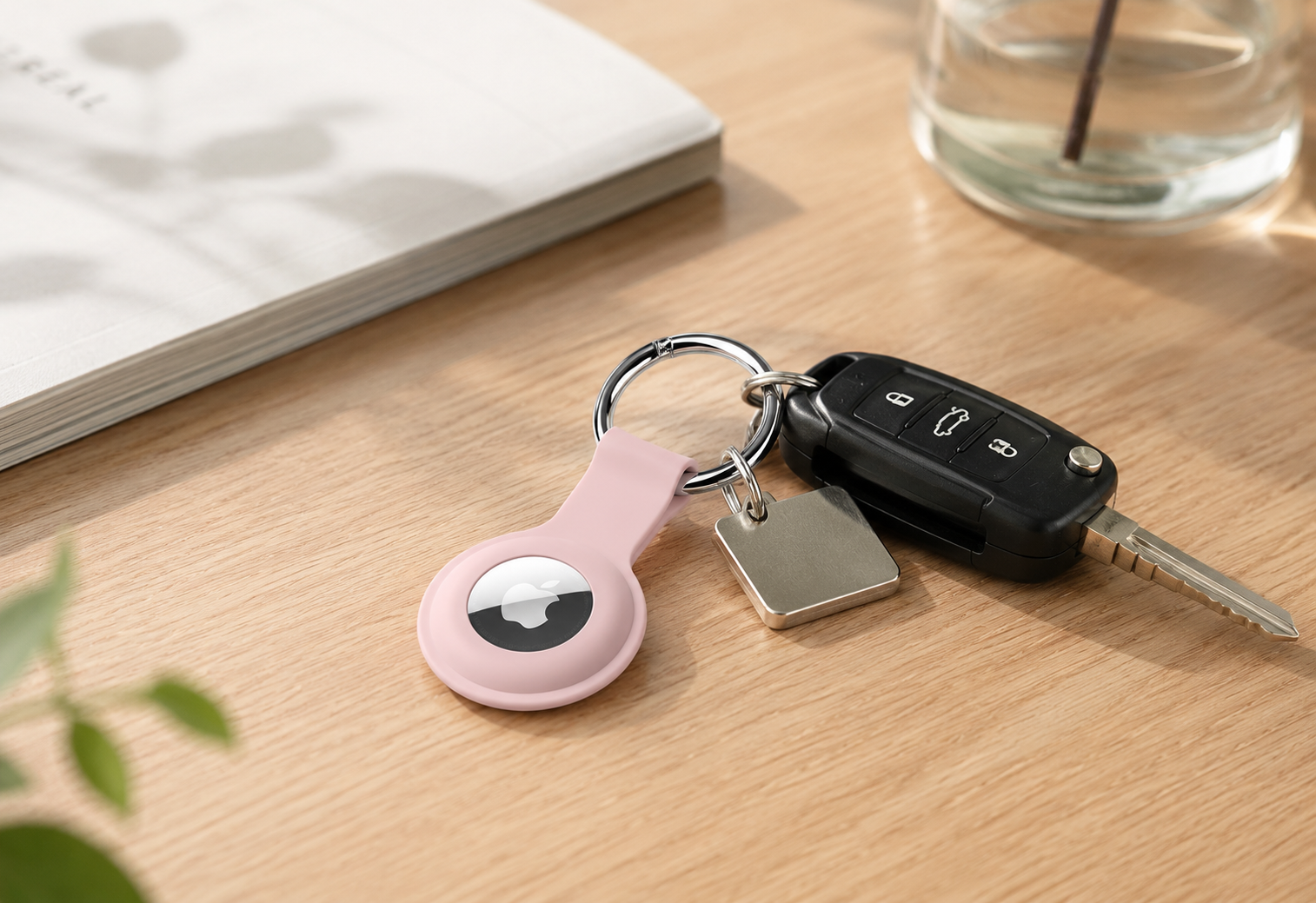 ColorCoral pink AirTag holder with car keys