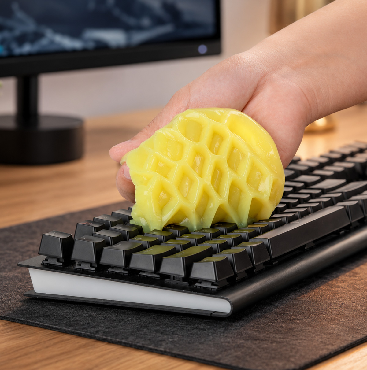 ColorCoral cleaning gel used on a keyboard